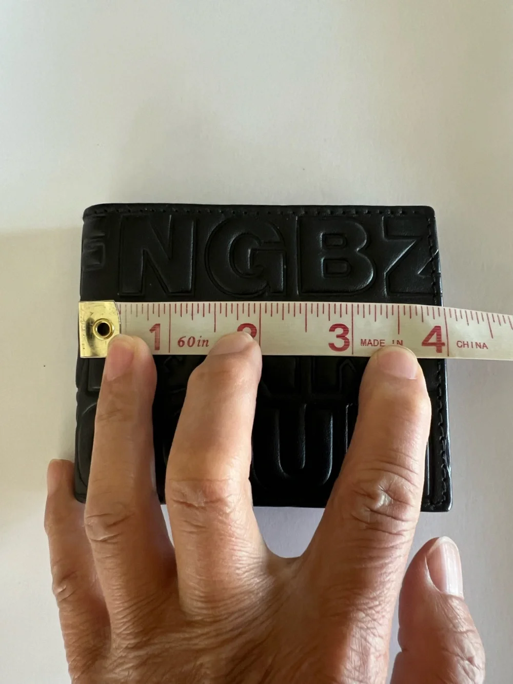New Comme des Garcons Embossed Leather Wallet